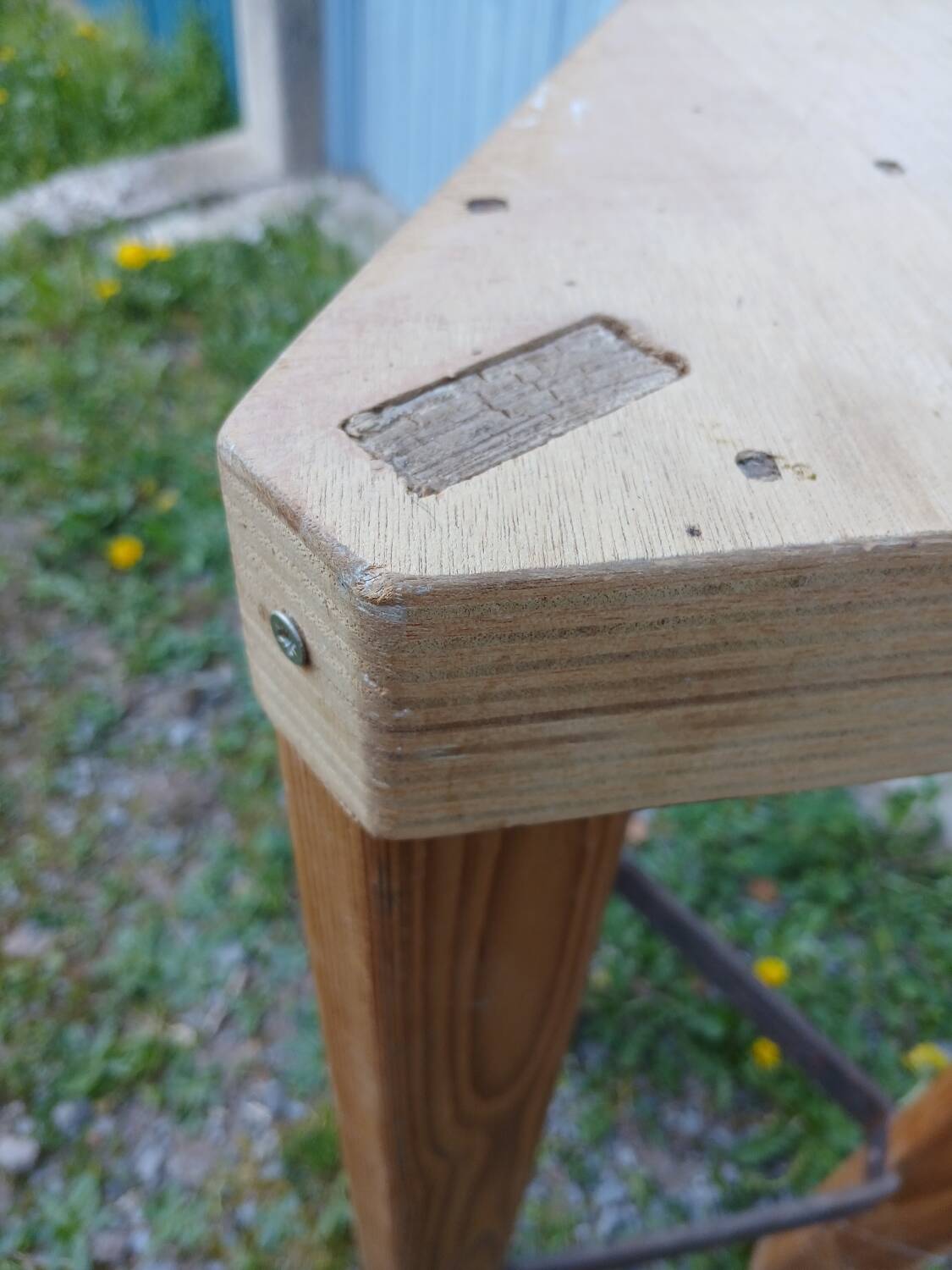 Antique saddle in raw wood and metal