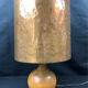 Vintage modernist lamp in wood and hammered copper.