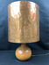 Vintage modernist lamp in wood and hammered copper.