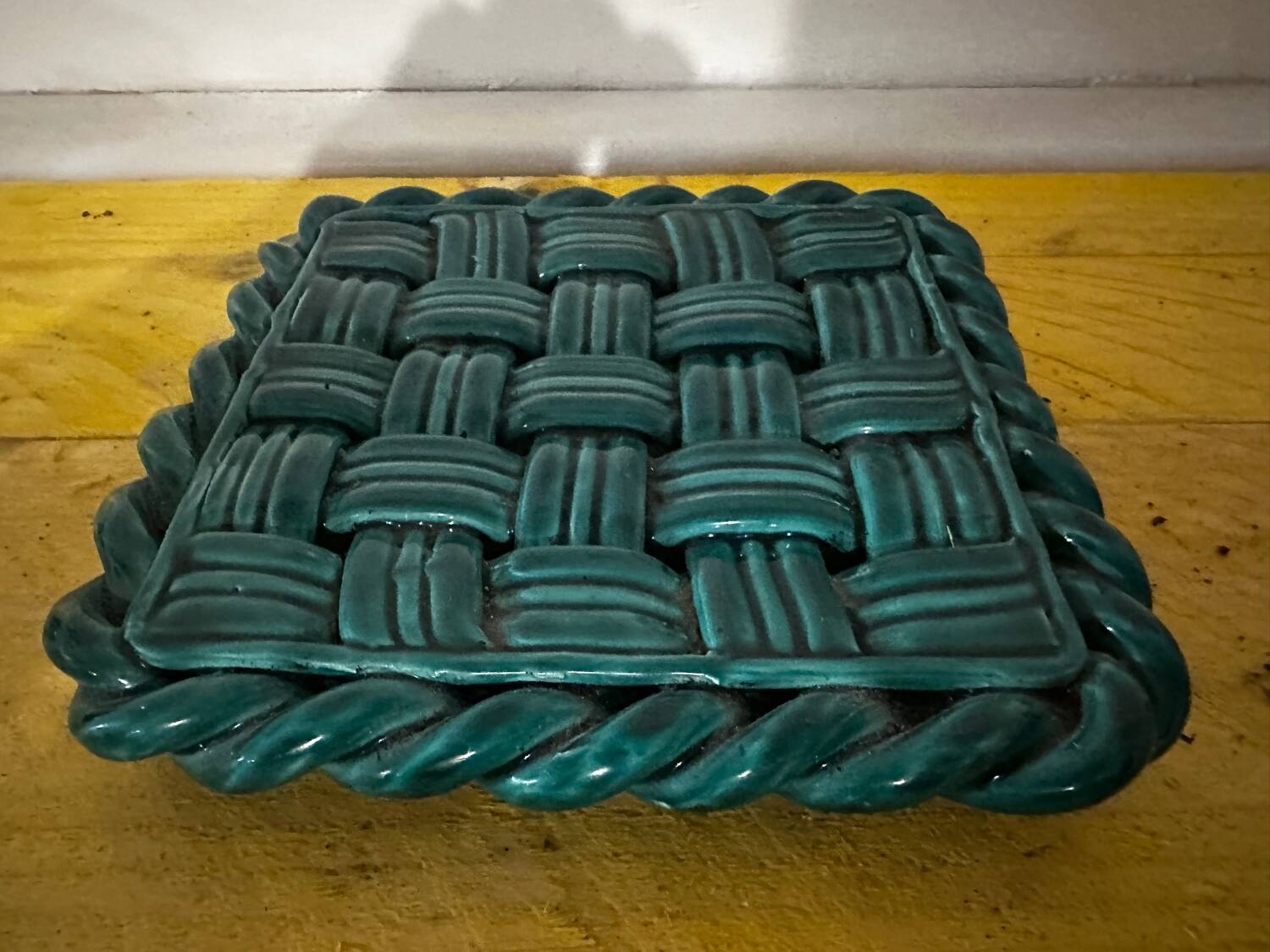 Woven ceramic trivet from Vallauris in the Massier style.