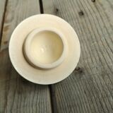 Little ancient teapot in ceramics color cream