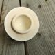 Little ancient teapot in ceramics color cream