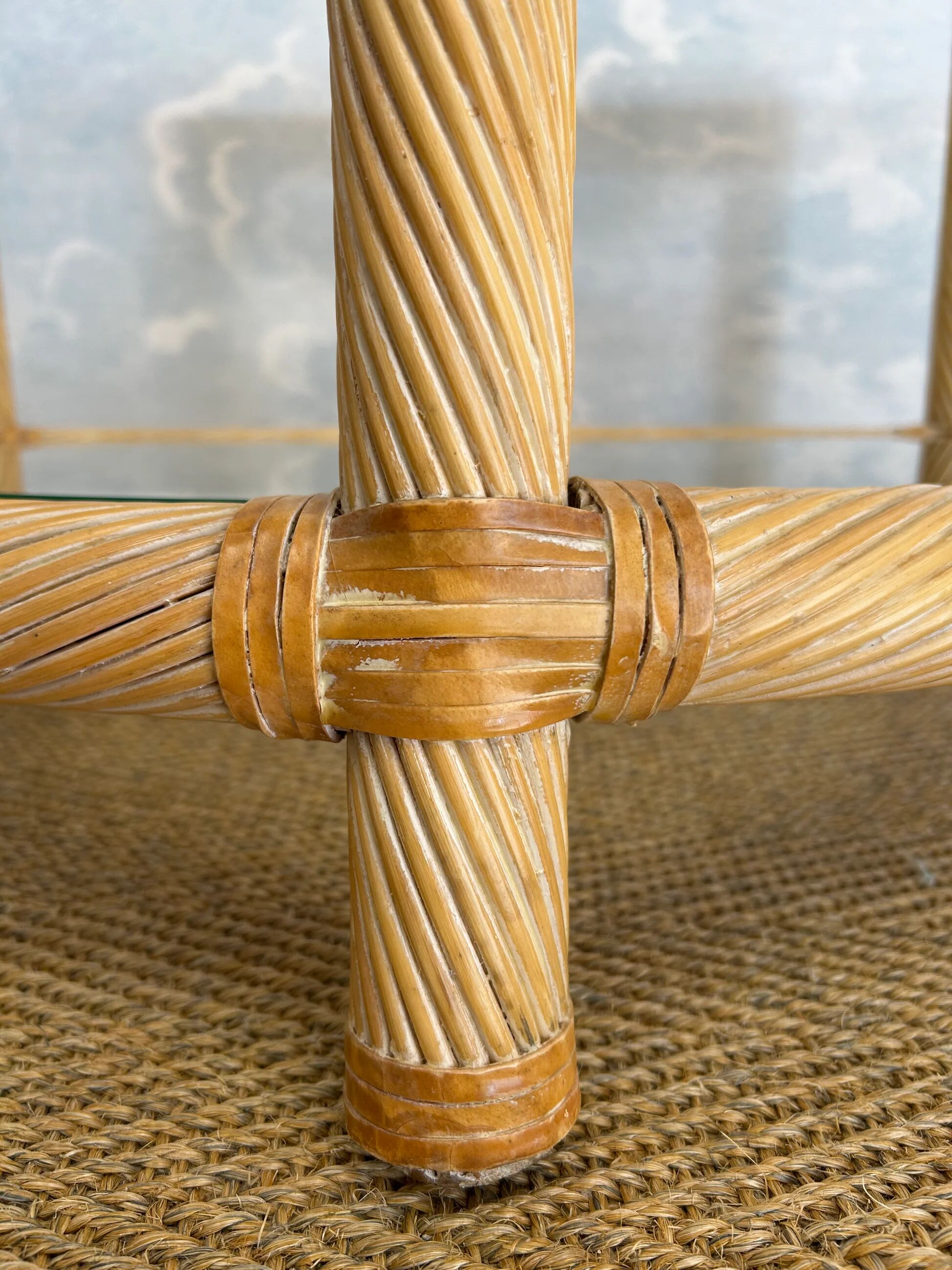 Two-tiered twisted rattan accent table with glass shelves, 1970s