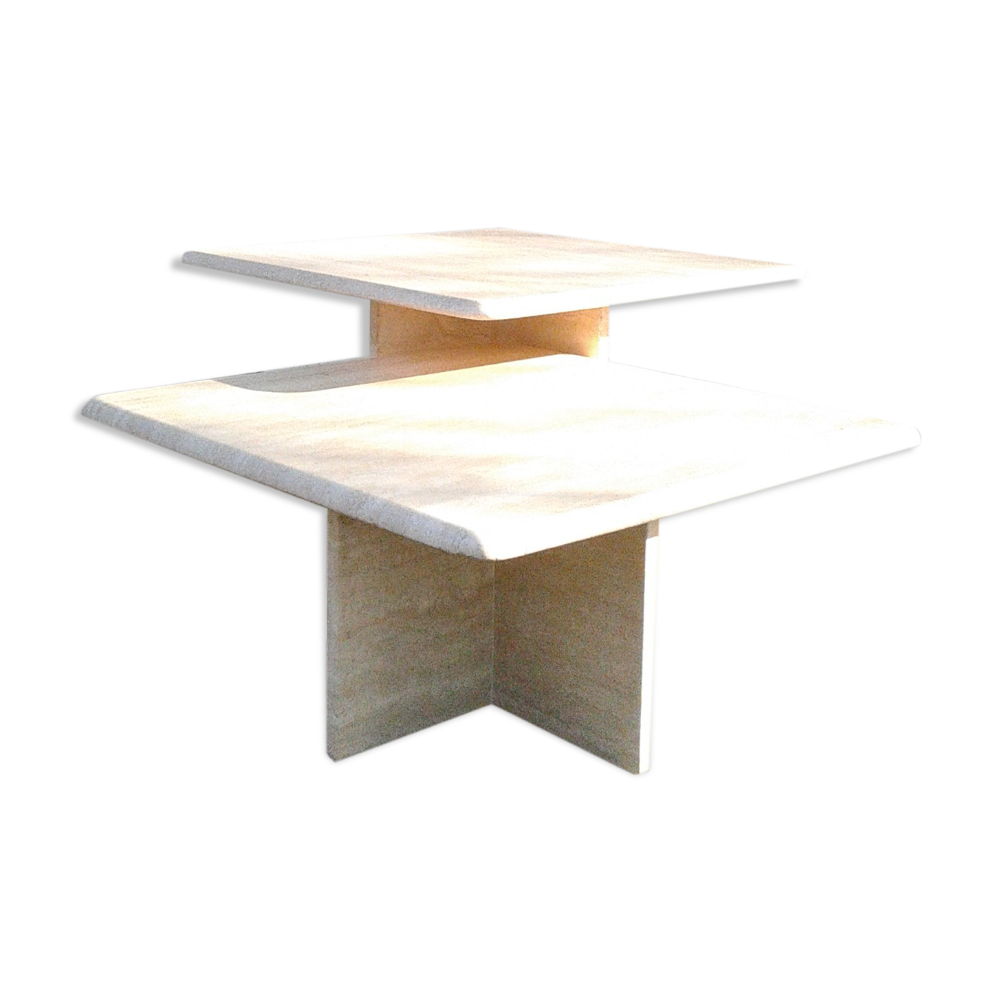 Two coffee tables giggle in travertine