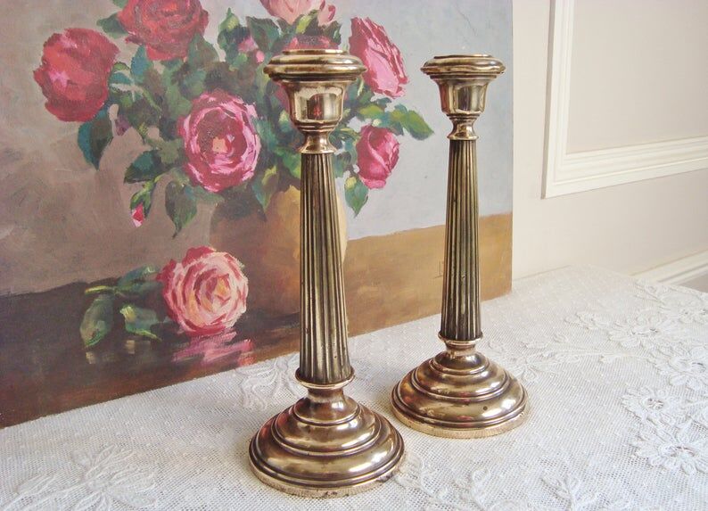 Pair of very old brass candlesticks