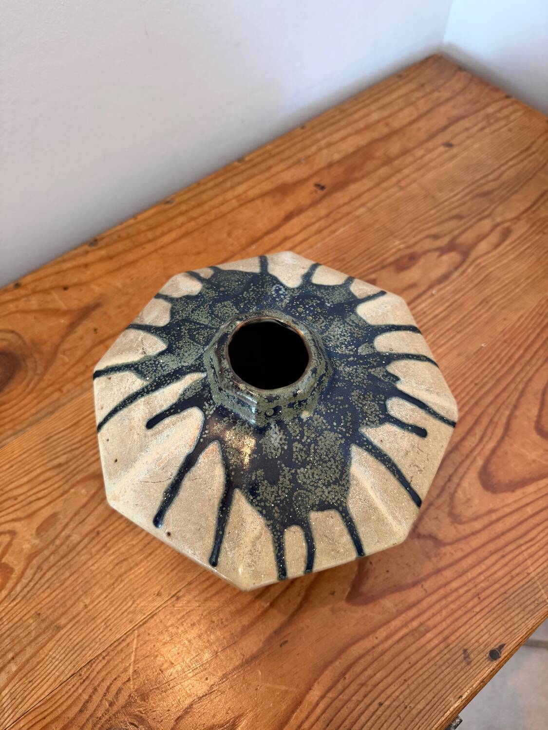Scandinavian studio vase in flamed stoneware with drip decorations.