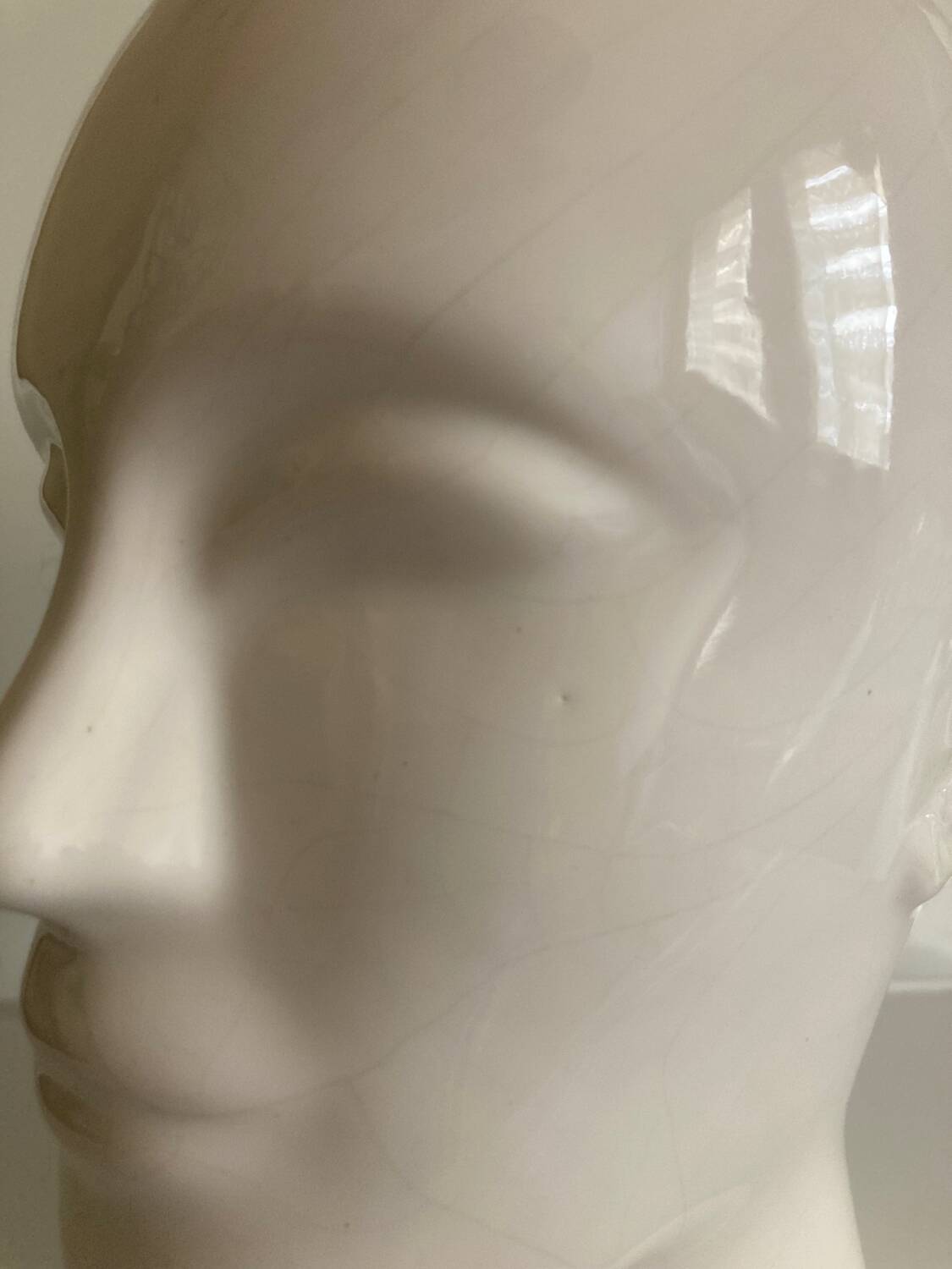 Vintage white ceramic face-shaped vase or planter