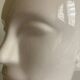Vintage white ceramic face-shaped vase or planter