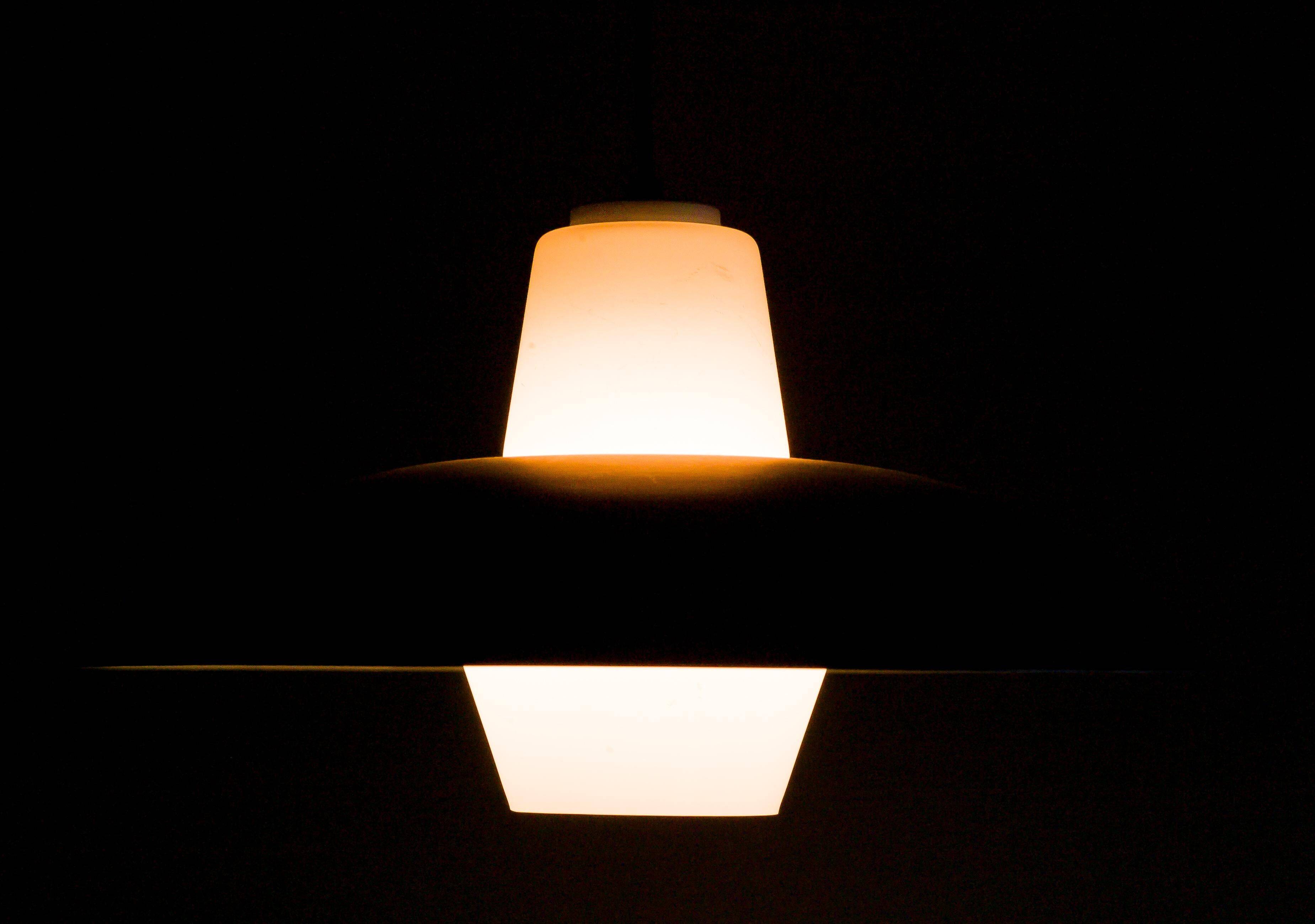 Philips pendant light in frosted sky blue glass by Louis Kalff