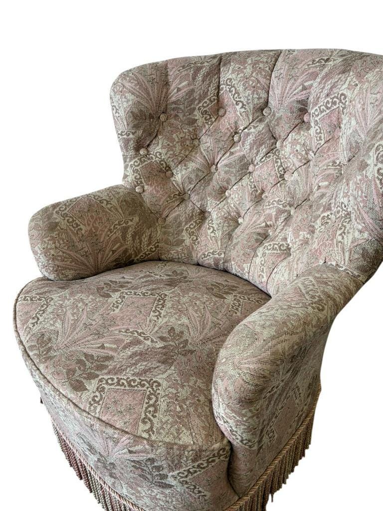 Fauteuil vintage rose clair à fleurs / fauteuil une place avec franges