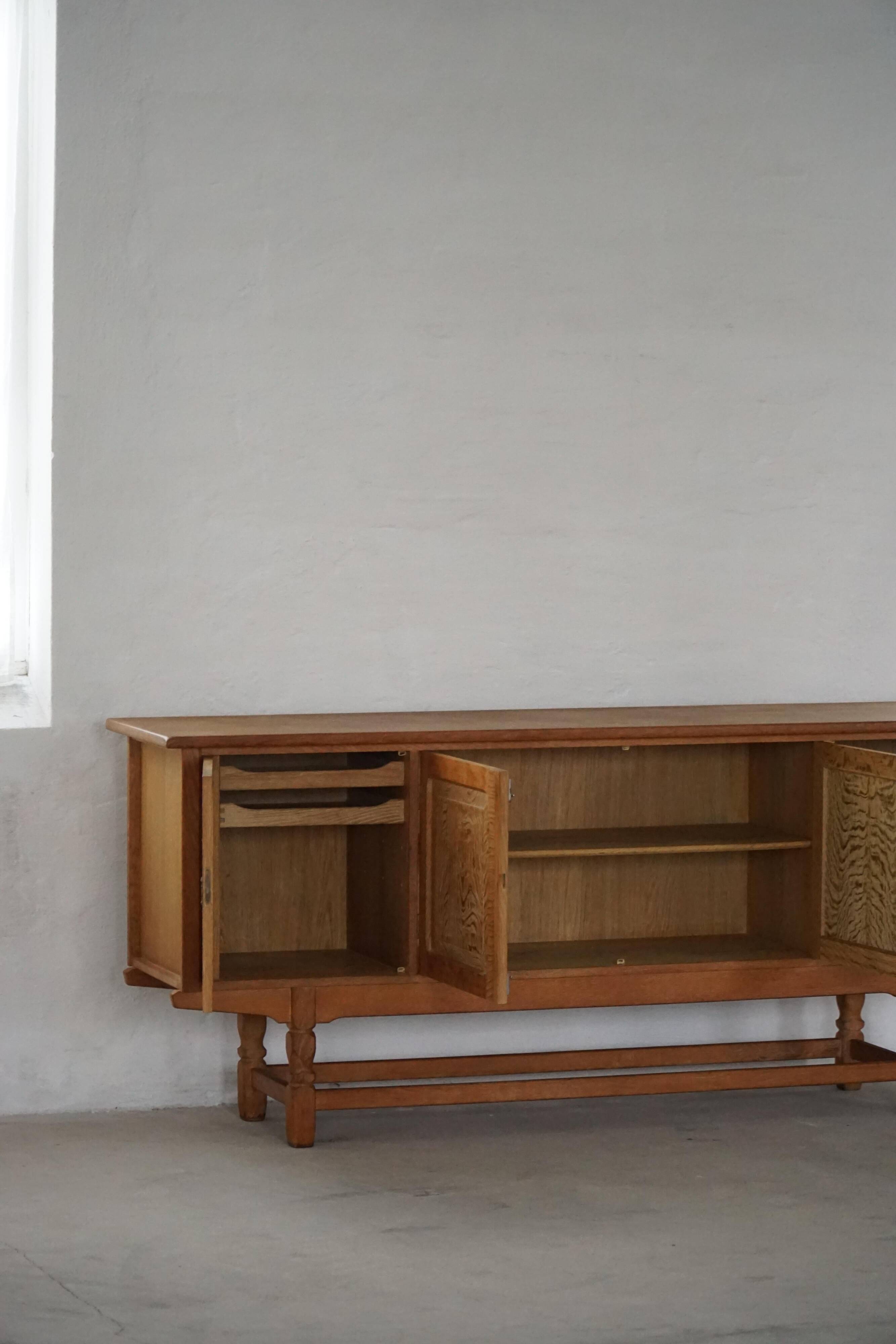 Low oak sideboard, mid-century modern, made by a Danish cabinetmaker, 1960s.