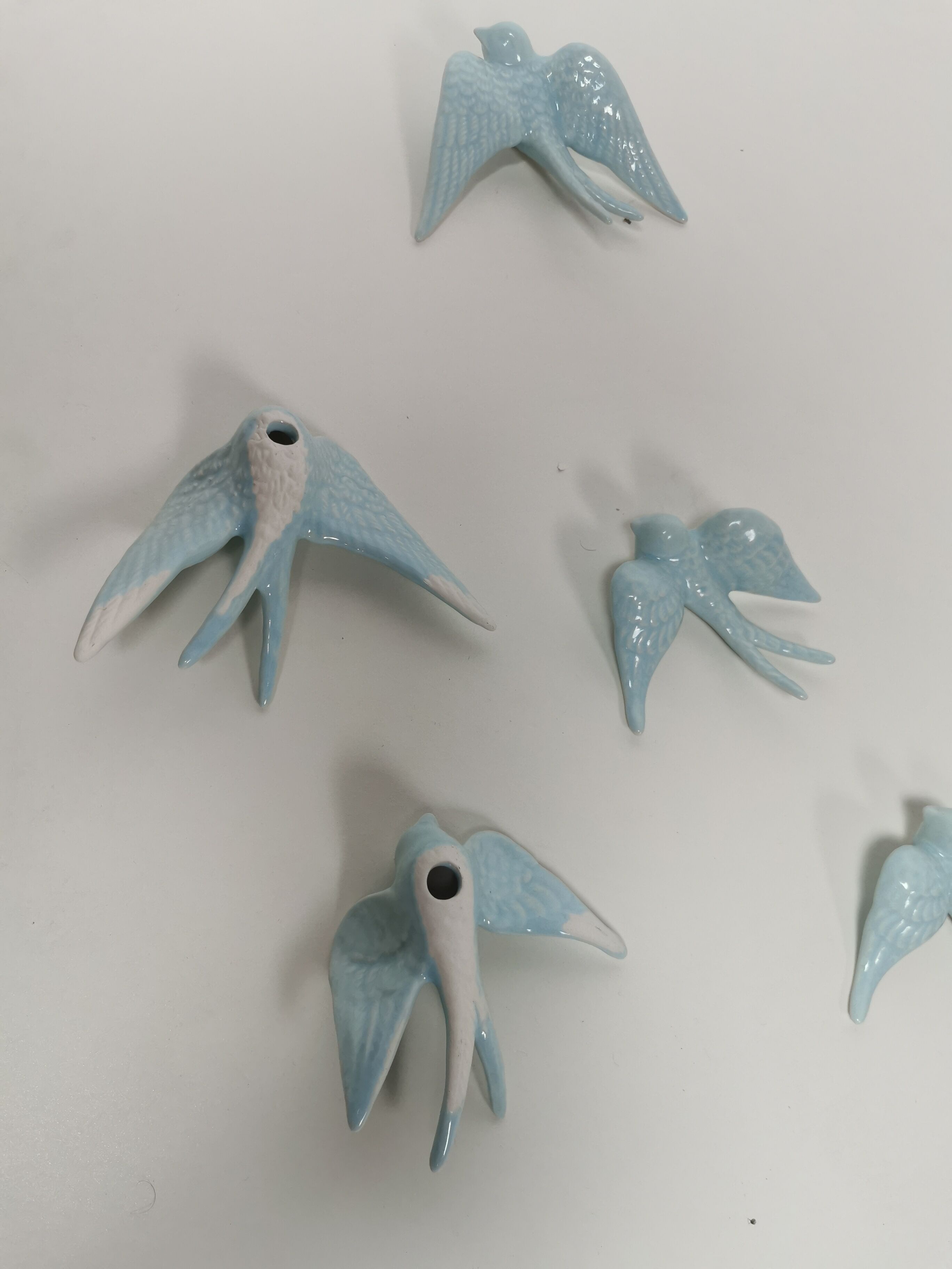 Batch of swallows in ceramic
