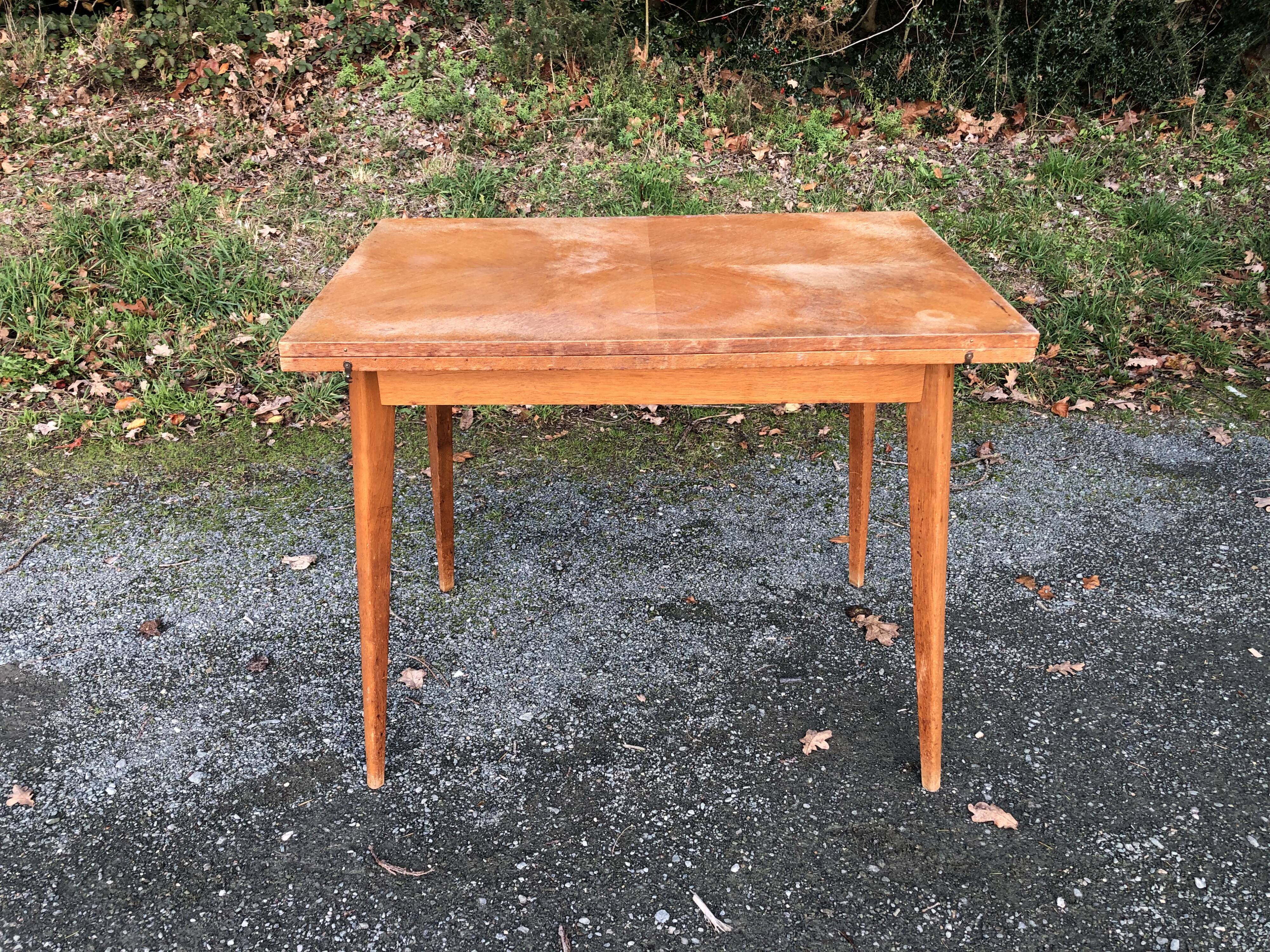 Vintage so-called portfolio table with oak compass base and its oak cp swivel top.