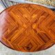 Old oval bedside table in rosewood marquetry Louis XV style