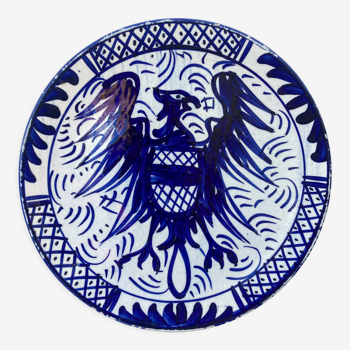 Assiette décorative en faïence bleu à décor de Phoenix signée Fabriquée en Espagne