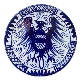 Assiette décorative en faïence bleu à décor de Phoenix signée Fabriquée en Espagne