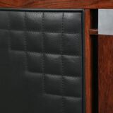 Art Deco design armchair with black leather with decorative stitching