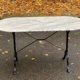 Table de bistrot marbre ovale et acier noire pétrole 4 couverts 140cm