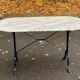 Oval bistro table in marble and petrol black steel, seats 4, 140cm