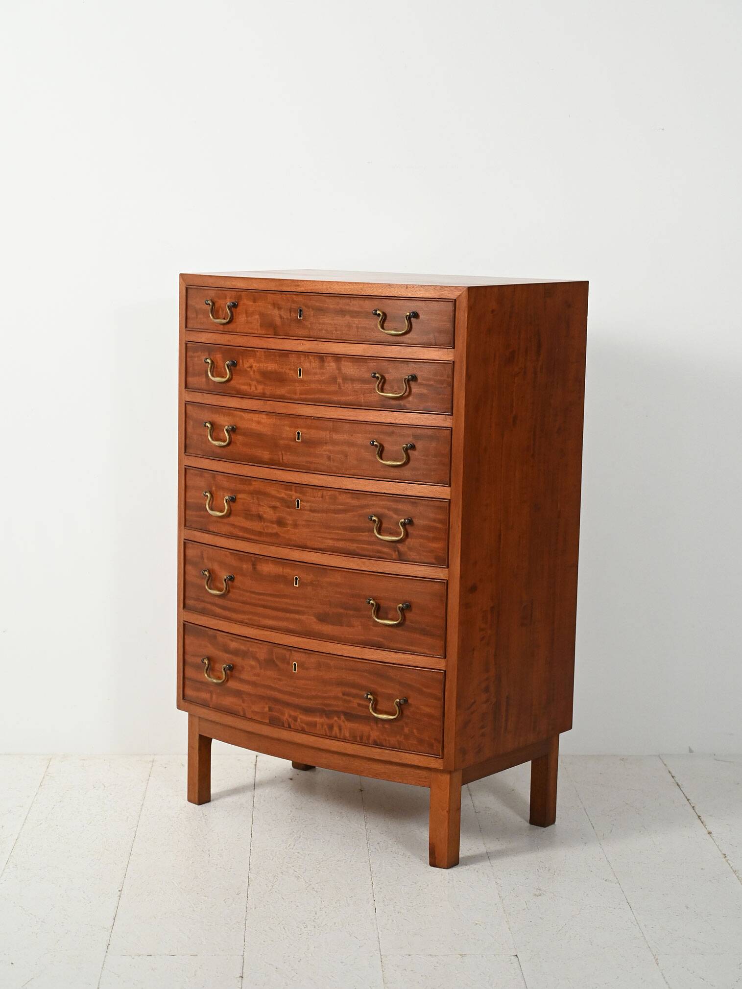 Scandinavian mahogany tallboy with brass handles