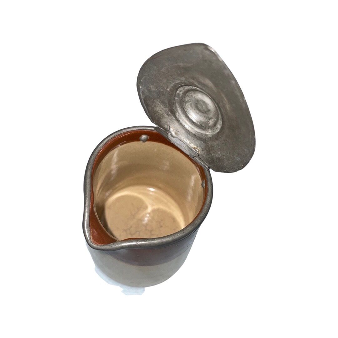 Small beige brown English earthenware milk jug