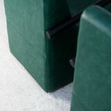 Pair of armrest heaters. Steel and green imitation leather. France, circa 1980