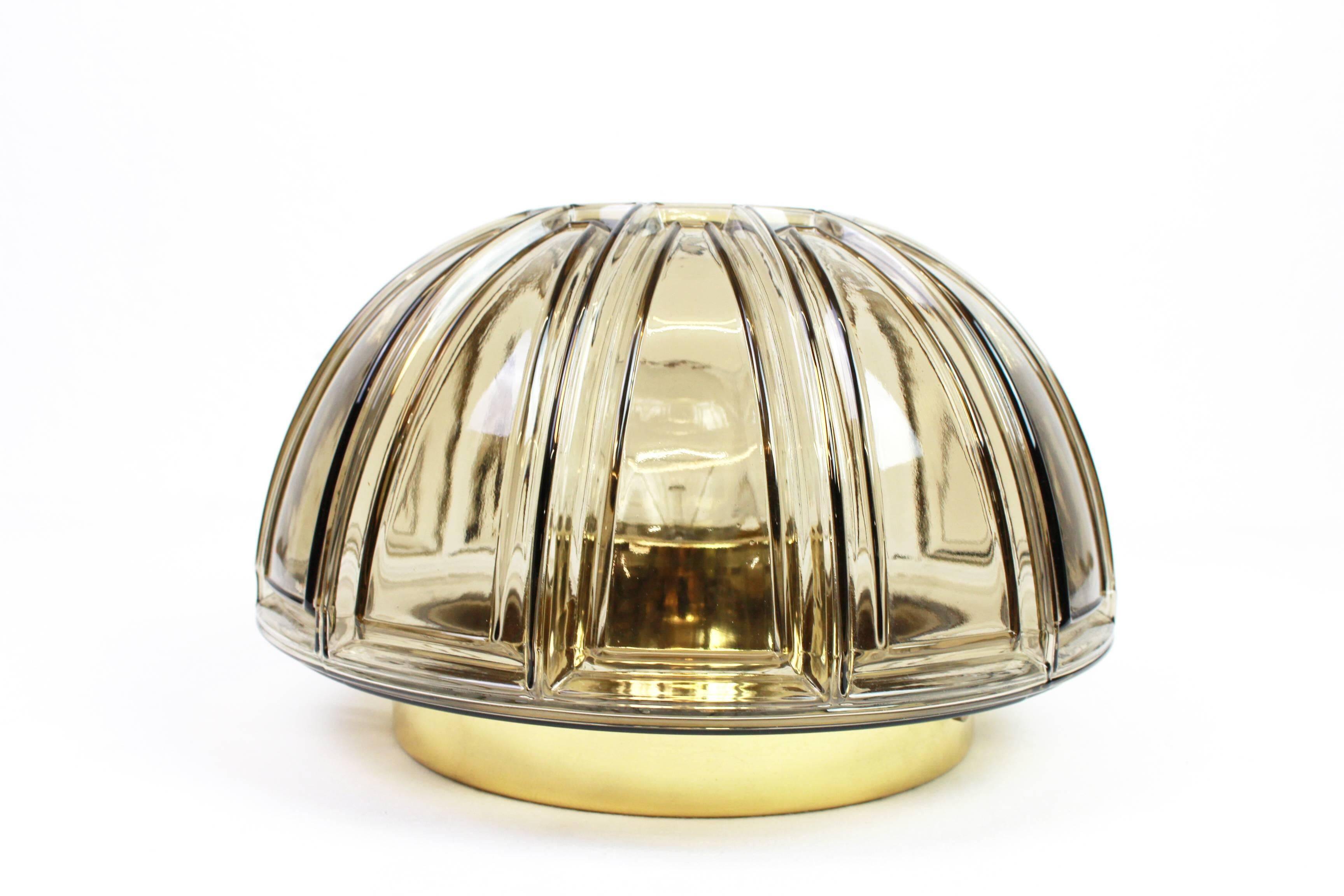 Pair of wall sconces or ceiling lights in brass and amber glass by Limburg, Germany, 1960s.