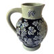 Pitcher in sandstone