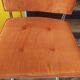 Pair of vintage cantilever chairs in chrome and orange corduroy.