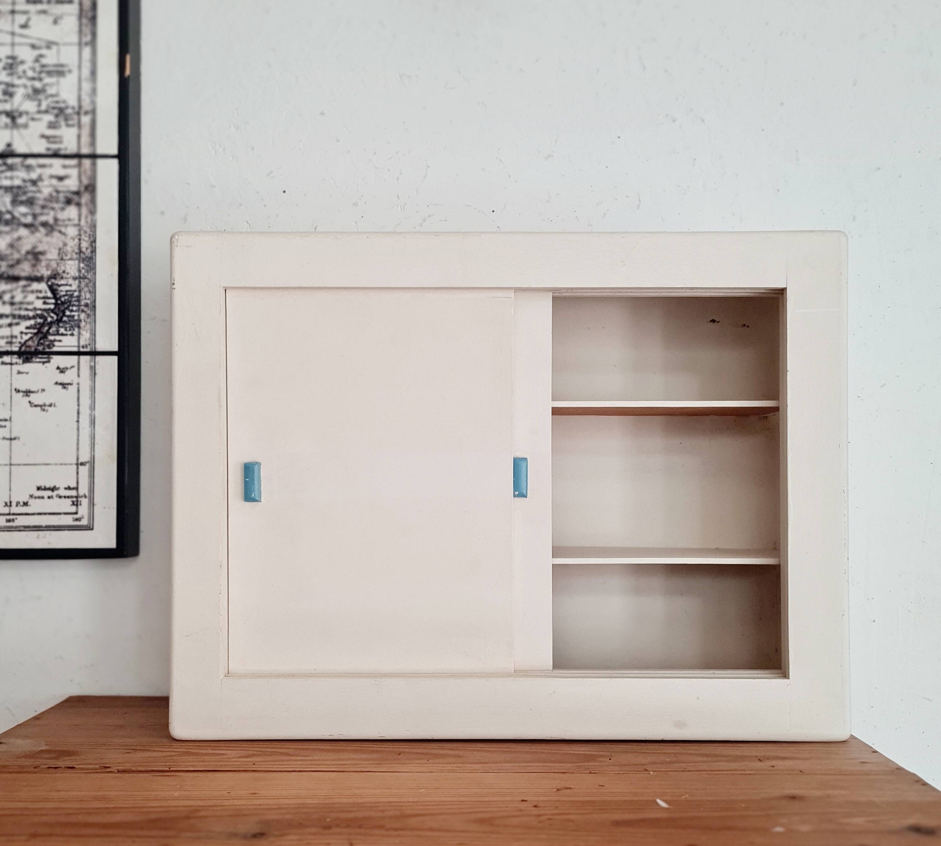 Old white medicine cabinet