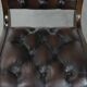 Chesterfield office chair in English style made of cow leather and wood.