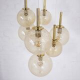 “Cascade” brass chandelier with amber globes