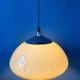 Beige acrylic glass mushroom pendant with a chrome top cap.