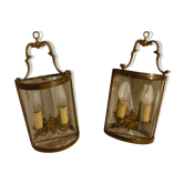 Paire d'applique miroir verre bombé bronze