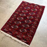 Bukhara rug with 12 panels in wool and burgundy silk, 88 x 54 cm.