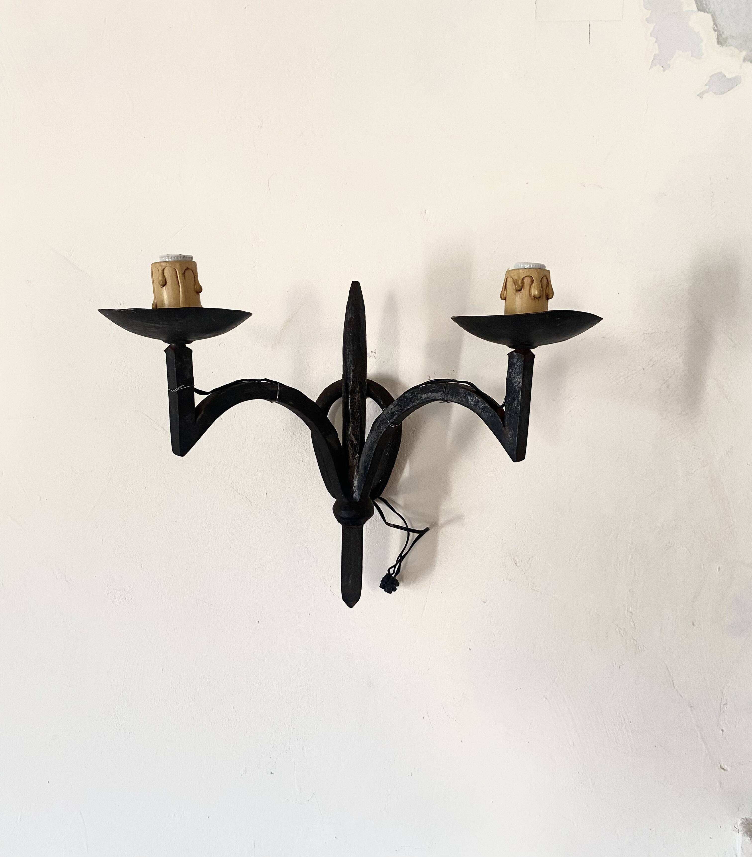 Wrought iron wall light with 2 lights