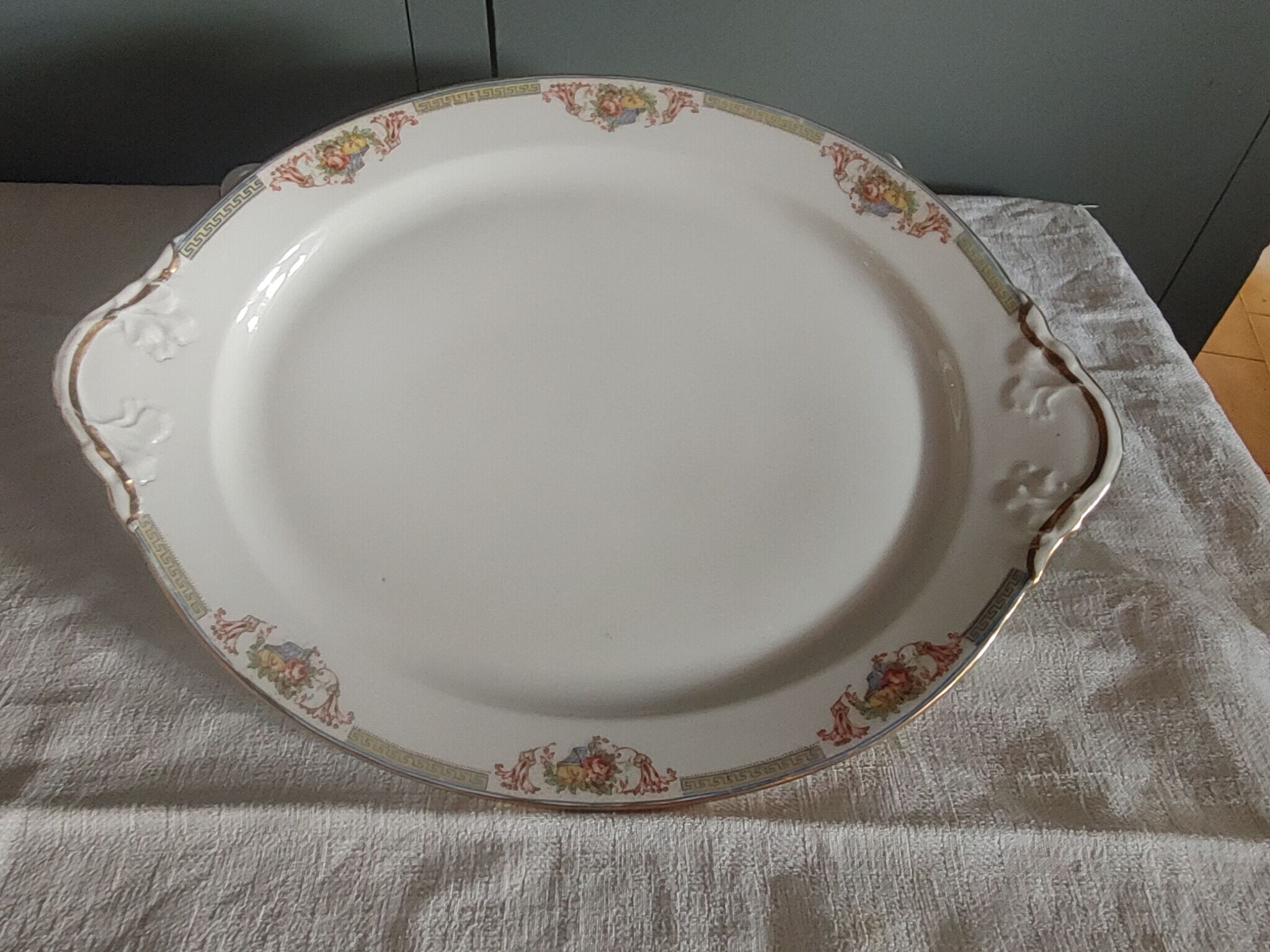 Large serving dish in Limoges porcelain Flower baskets, fruit - early 20th