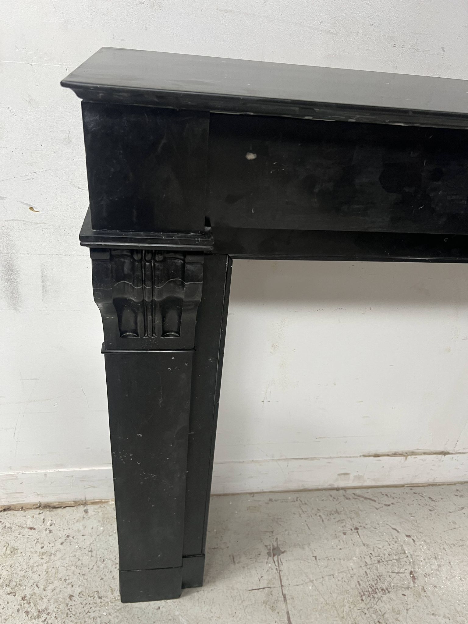Napoleon III period fireplace with a black marble corbel. 19th century.