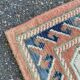 Large oriental wool rug with terracotta geometric patterns 200x300cm