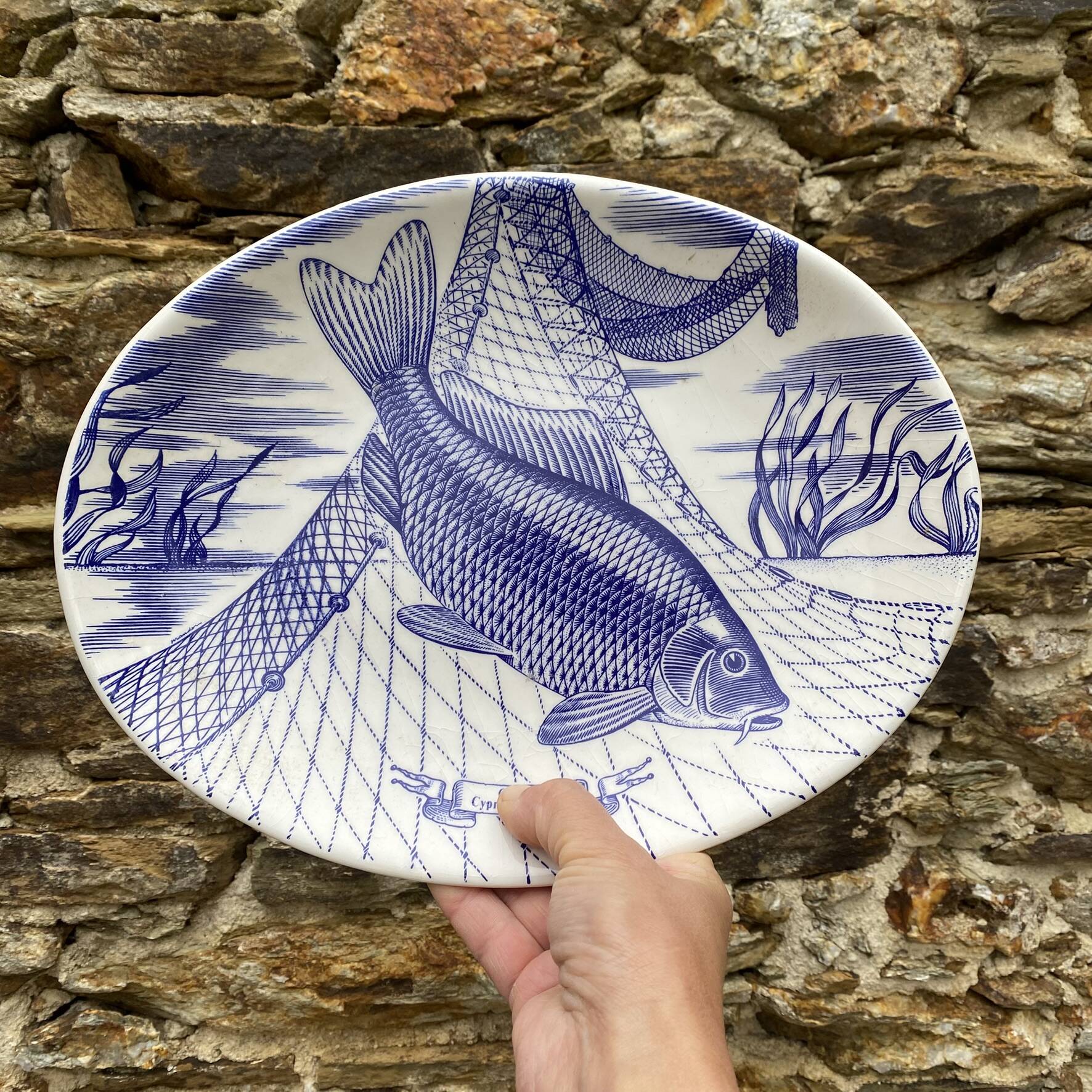 Plates and dish, fish service with cobalt blue decoration.