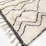Berber rug Beni Ouarain with black graphic patterns 301x193cm