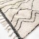 Berber rug Beni Ouarain with black graphic patterns 301x193cm