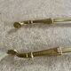 Brass fireplace tools in the style of Maison Baguès.