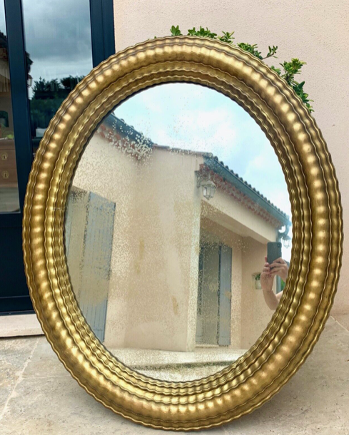 Oval mirror louis XVl with gilded cartouch, napoleon lll, XlXth high 106 cm