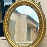 Oval mirror louis XVl with gilded cartouch, napoleon lll, XlXth high 106 cm