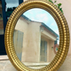 Oval mirror louis XVl with gilded cartouch, napoleon lll, XlXth high 106 cm