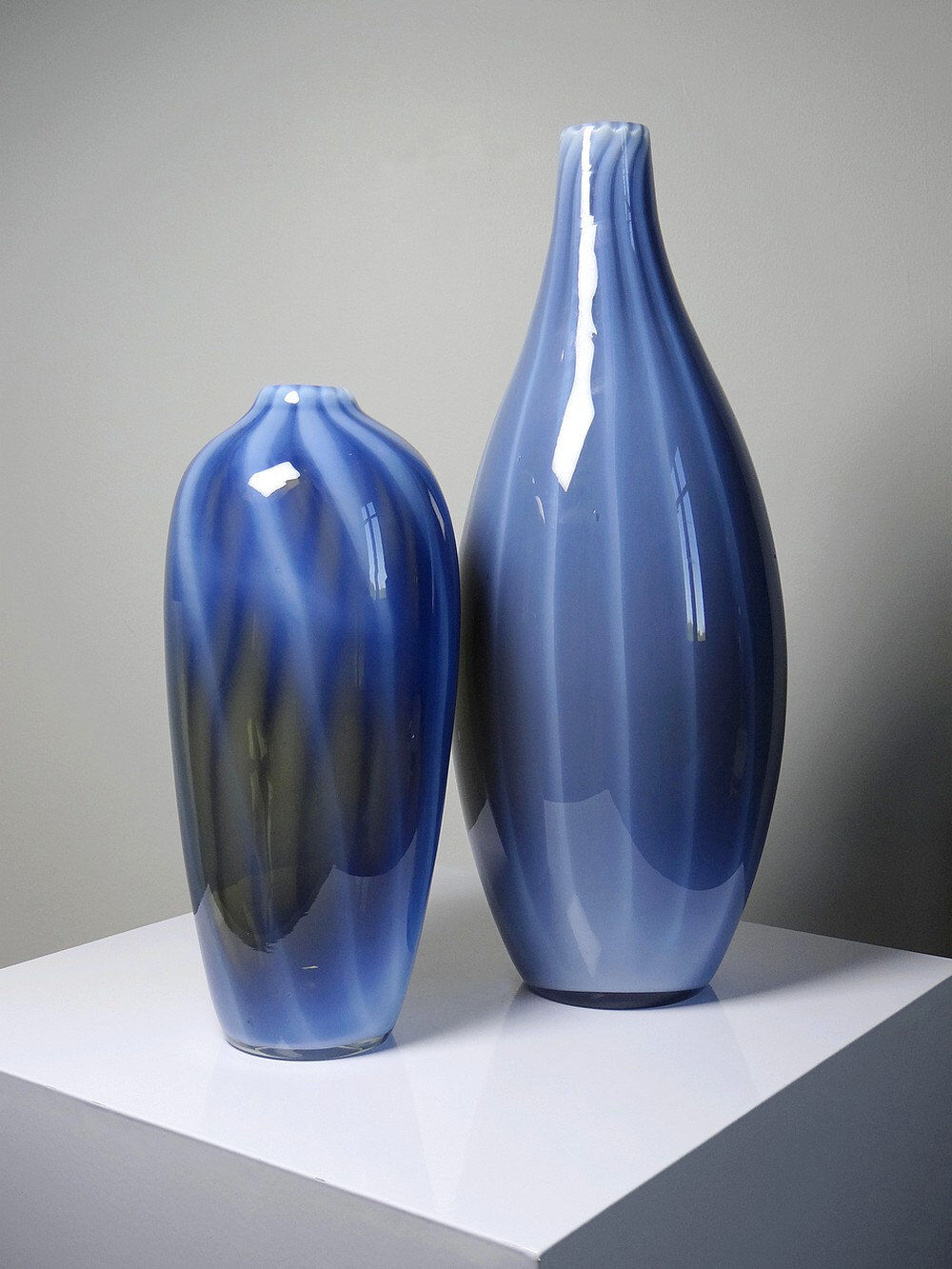 Pair of vintage smoky glass vases lined with opaline, Murano bubble glass.
