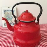 Red enameled metal teapot with chain