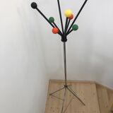 Wearing chrome parrot coat, black and multicolored balls