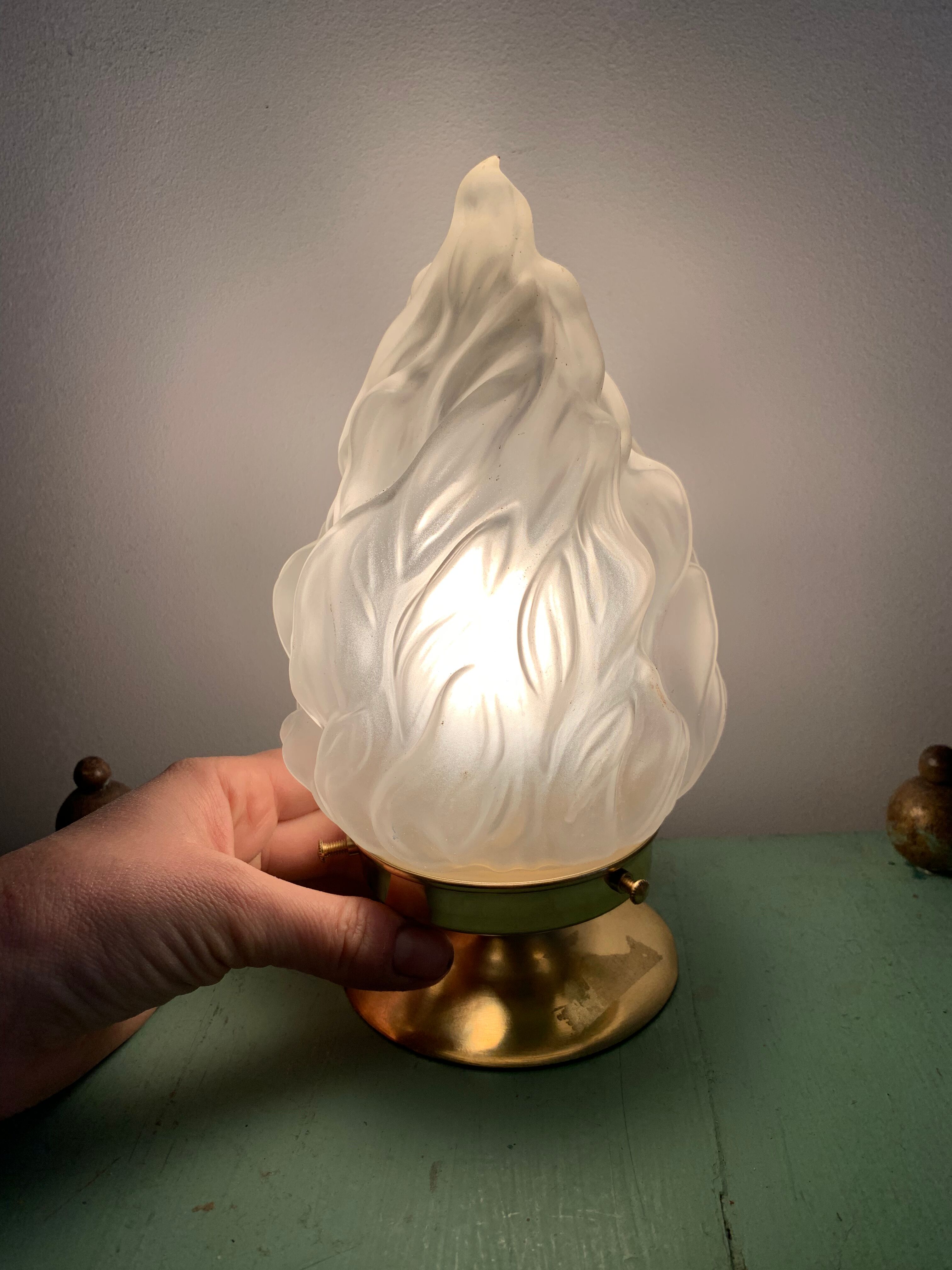 Old laying flame lamp